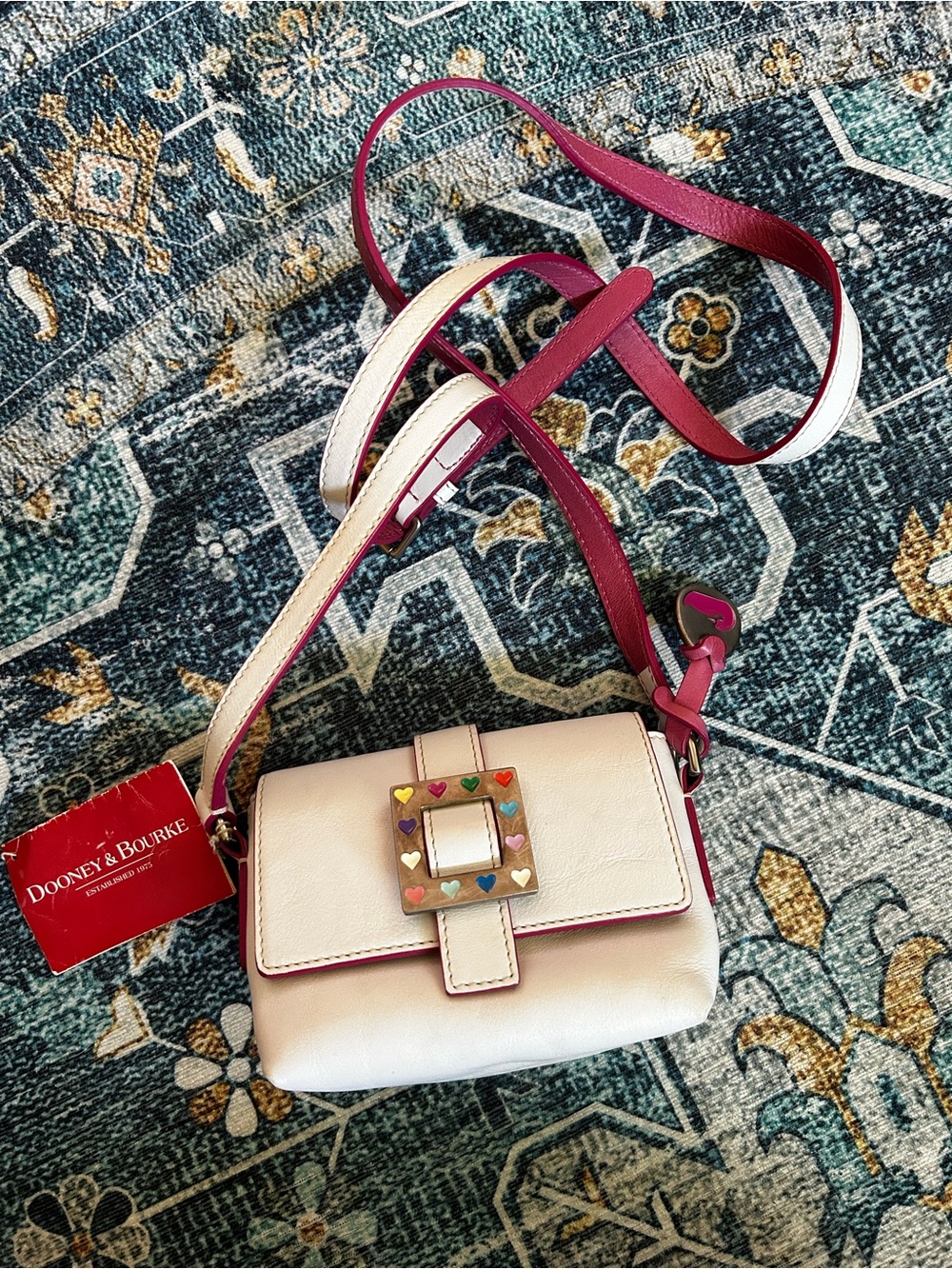 Dooney & Bourke Cream Crossbody with Pink Trim and Multicolor Heart Buckle